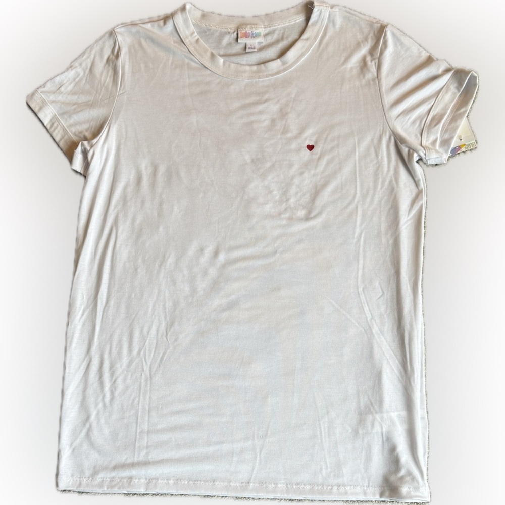 LuLaRoe White Liv T-Shirt with Red Heart on the front and ‘Follow Your Heart’